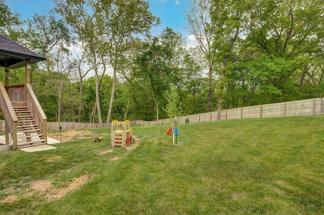 1611 E Hayloft Dr, Ozark, MO 65721 - fenced backyard featuring stairway
