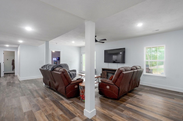 1611 E Hayloft Dr, Ozark, MO 65721 - living area with dark wood-type flooring, ceiling fan, recessed lighting, and a glass covered fireplace