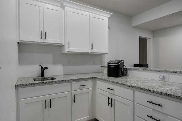 1611 E Hayloft Dr, Ozark, MO 65721 - kitchen featuring white cabinets and light stone counters