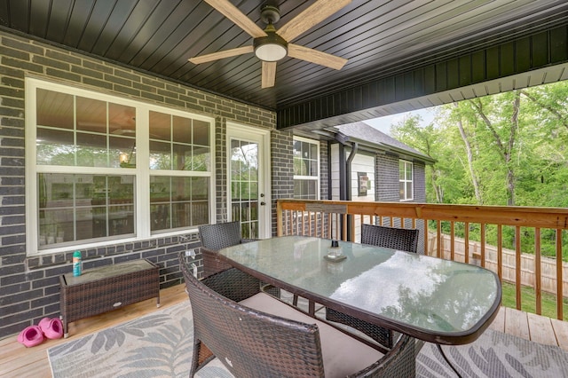 1611 E Hayloft Dr, Ozark, MO 65721 - wooden terrace with outdoor dining space and a ceiling fan