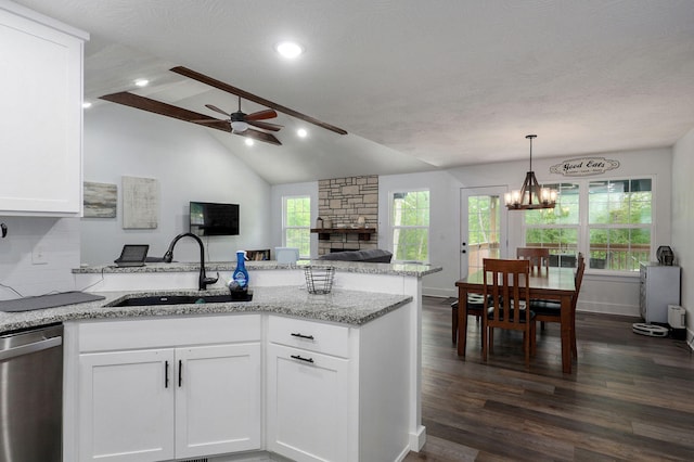 1611 E Hayloft Dr, Ozark, MO 65721 - kitchen with a peninsula, dishwasher, a ceiling fan, dark wood-style floors, and white cabinets