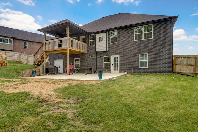 1611 E Hayloft Dr, Ozark, MO 65721 - rear view of property with a ceiling fan, a fenced backyard, and brick siding