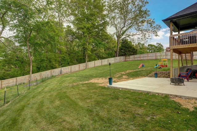1611 E Hayloft Dr, Ozark, MO 65721 - fenced backyard featuring a patio, an outdoor fire pit, a wooden deck, and stairway