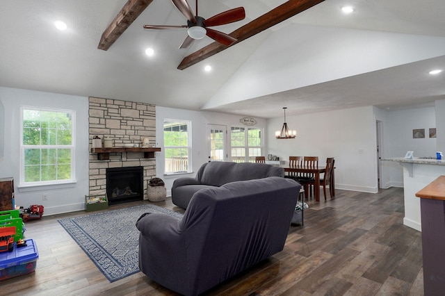 1611 E Hayloft Dr, Ozark, MO 65721 - living area with ceiling fan, beamed ceiling, dark wood finished floors, a chandelier, and a stone fireplace