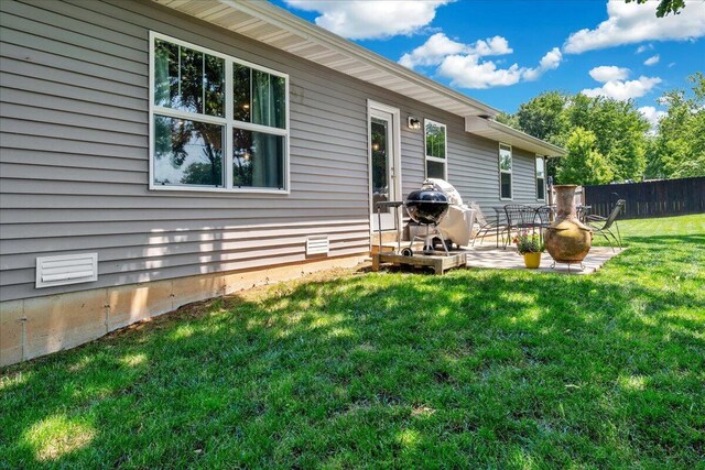 1651 N Penrose Ave, Nixa, MO 65714 - rear view of property with a patio