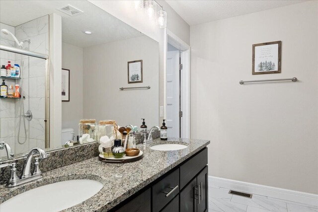 1651 N Penrose Ave, Nixa, MO 65714 - full bath featuring marble finish flooring, double vanity, and a stall shower