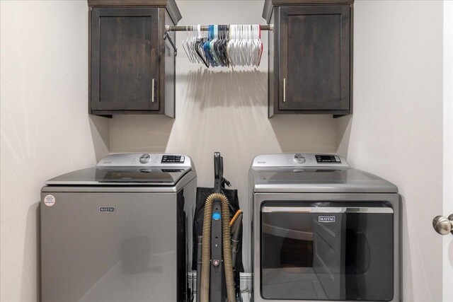 1651 N Penrose Ave, Nixa, MO 65714 - washroom featuring washer and dryer and cabinet space