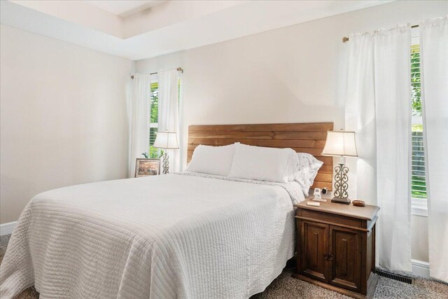 1651 N Penrose Ave, Nixa, MO 65714 - carpeted bedroom featuring baseboards