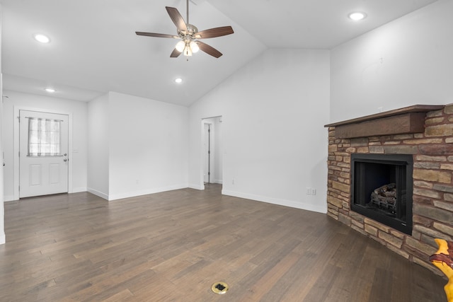 121 S Aspen St, Buffalo, MO 65622 - unfurnished living room with a ceiling fan, lofted ceiling, dark wood-style flooring, a stone fireplace, and recessed lighting
