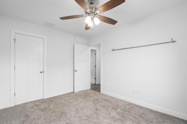 121 S Aspen St, Buffalo, MO 65622 - unfurnished bedroom featuring carpet floors and ceiling fan