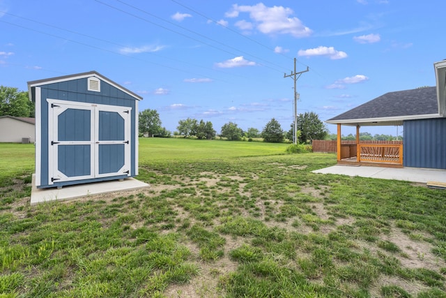 121 S Aspen St, Buffalo, MO 65622 - view of green lawn featuring a storage unit