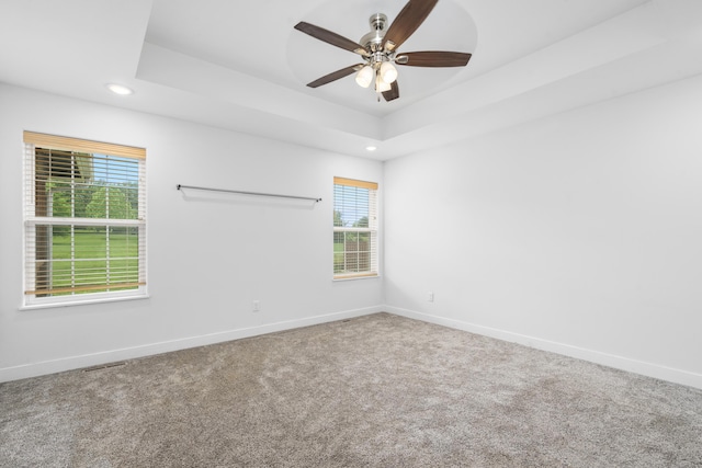 121 S Aspen St, Buffalo, MO 65622 - spare room featuring recessed lighting, a ceiling fan, carpet flooring, and a tray ceiling