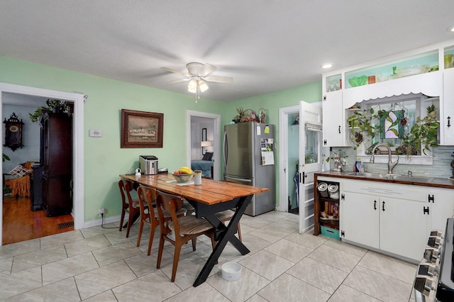 223 E Mill St, Republic, MO 65738 - dining area featuring ceiling fan, light tile patterned floors, and recessed lighting