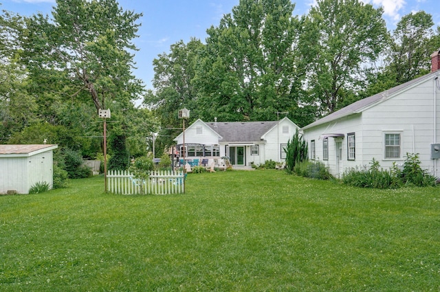 223 E Mill St, Republic, MO 65738 - view of yard with a sunroom and a shed