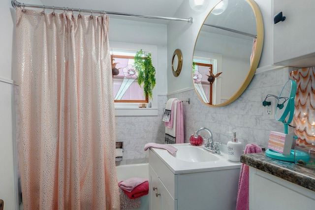 223 E Mill St, Republic, MO 65738 - bathroom featuring vanity and tile walls