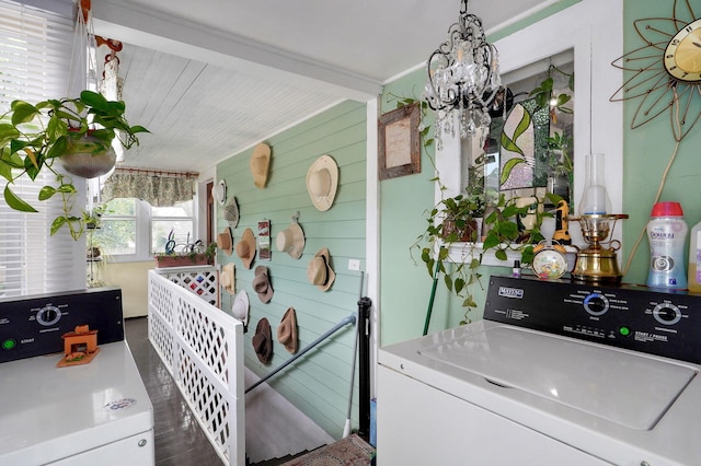 223 E Mill St, Republic, MO 65738 - washroom featuring washer / dryer, a chandelier, and wood walls