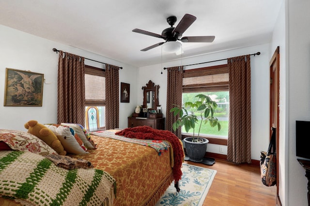 223 E Mill St, Republic, MO 65738 - bedroom with light wood-style floors and ceiling fan