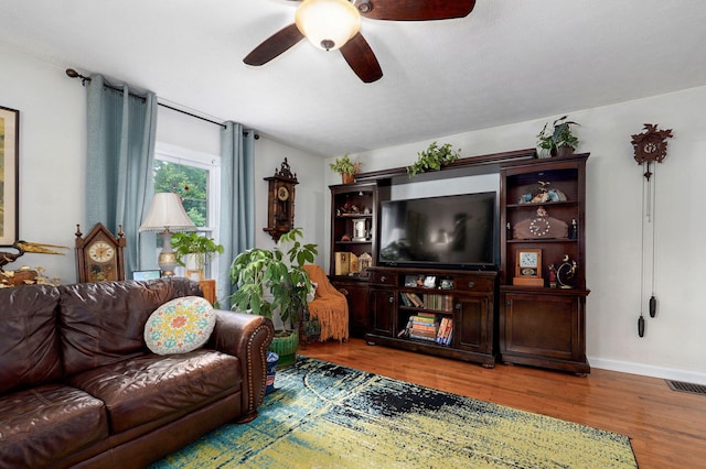 223 E Mill St, Republic, MO 65738 - living room with wood finished floors and ceiling fan