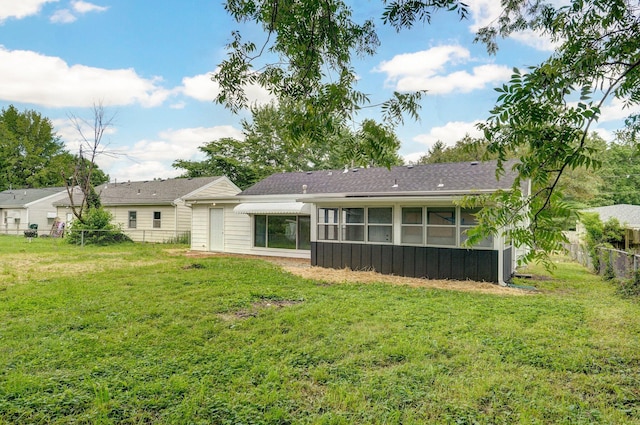 1317 S Willow Ave, Springfield, MO 65804 - rear view of property with a sunroom and a shingled roof