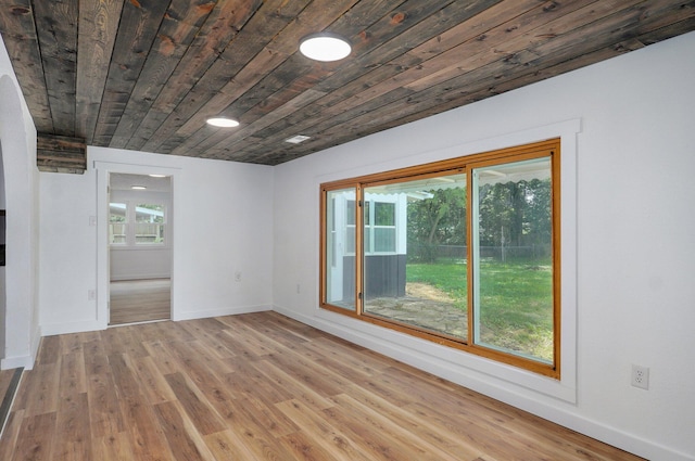 1317 S Willow Ave, Springfield, MO 65804 - empty room featuring wood ceiling and wood finished floors