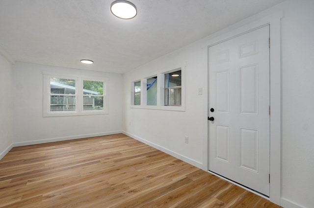 1317 S Willow Ave, Springfield, MO 65804 - entryway with light wood-type flooring and baseboards