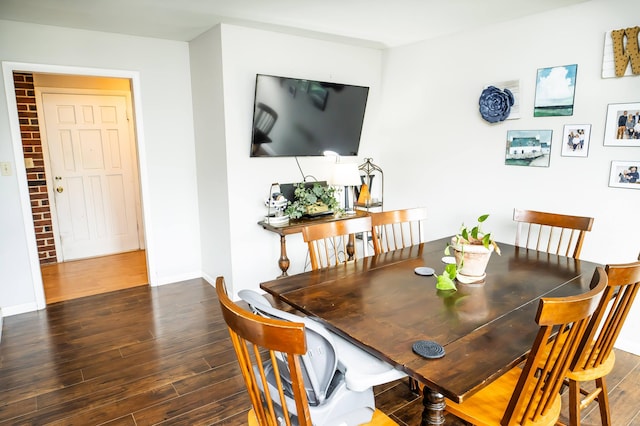 343 N Wood Ln, Fair Grove, MO 65648 - dining area with wood finished floors and baseboards