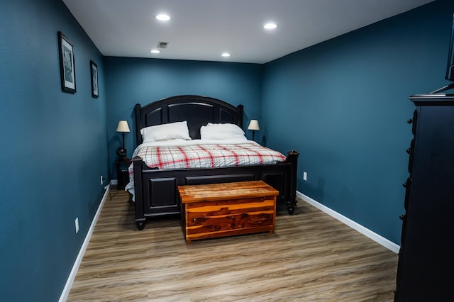 343 N Wood Ln, Fair Grove, MO 65648 - bedroom with wood finished floors and recessed lighting