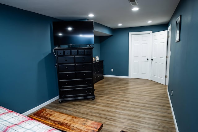 343 N Wood Ln, Fair Grove, MO 65648 - bedroom with wood finished floors and recessed lighting