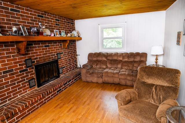 343 N Wood Ln, Fair Grove, MO 65648 - living room featuring wooden ceiling, wood finished floors, and a fireplace