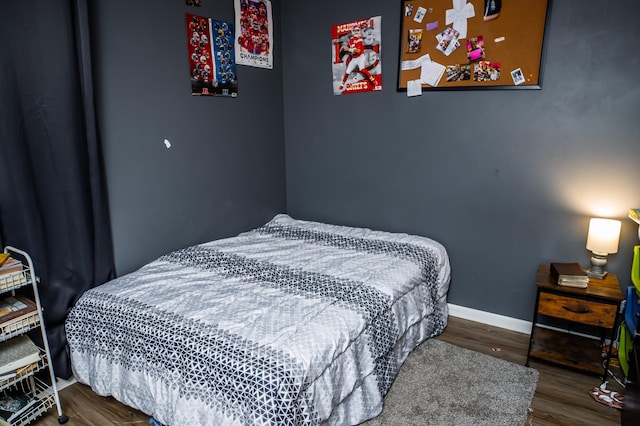343 N Wood Ln, Fair Grove, MO 65648 - bedroom featuring wood finished floors and baseboards