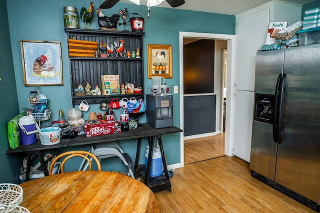 343 N Wood Ln, Fair Grove, MO 65648 - kitchen featuring stainless steel refrigerator with ice dispenser, wood finished floors, and a ceiling fan