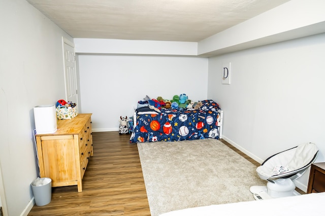 343 N Wood Ln, Fair Grove, MO 65648 - bedroom with wood finished floors and baseboards