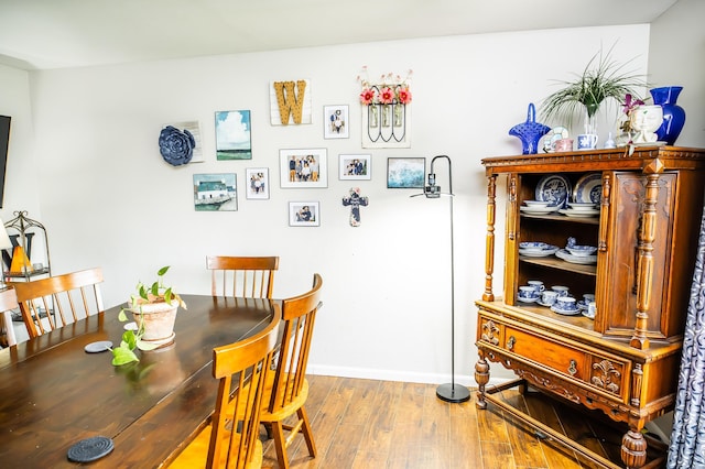 343 N Wood Ln, Fair Grove, MO 65648 - dining space with wood finished floors and baseboards