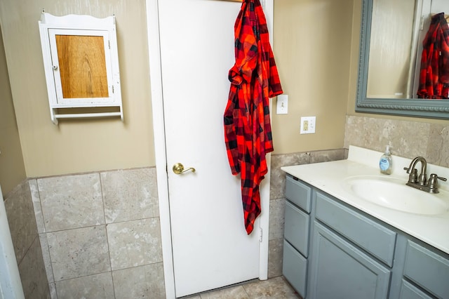 343 N Wood Ln, Fair Grove, MO 65648 - bathroom featuring vanity and tile walls