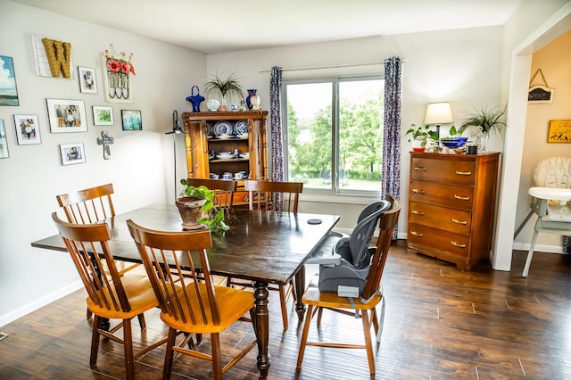 343 N Wood Ln, Fair Grove, MO 65648 - dining room with dark wood-type flooring and baseboards