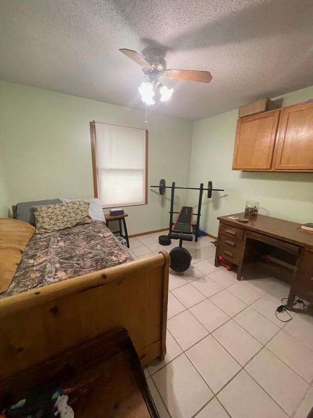 177 Marla Cir, Ozark, MO 65721 - bedroom with light tile patterned floors, a textured ceiling, and a ceiling fan