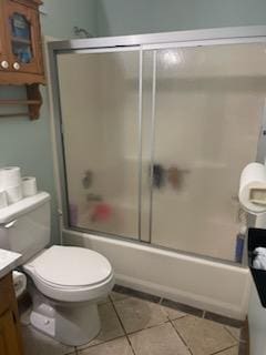 177 Marla Cir, Ozark, MO 65721 - full bath with vanity, tile patterned floors, and combined bath / shower with glass door