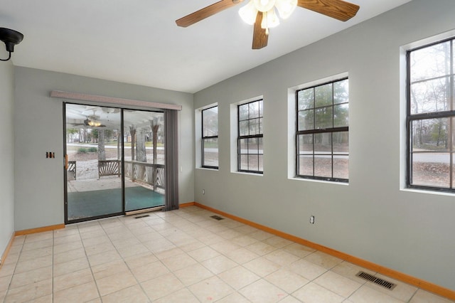 131 Forest Ln, Kimberling City, MO 65686 - empty room with ceiling fan and baseboards