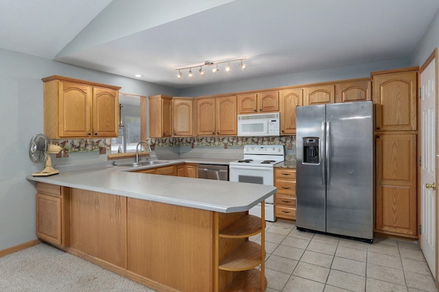 131 Forest Ln, Kimberling City, MO 65686 - kitchen featuring stainless steel appliances, a peninsula, open shelves, light countertops, and light tile patterned flooring