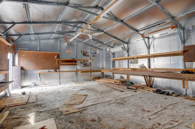 131 Forest Ln, Kimberling City, MO 65686 - miscellaneous room with lofted ceiling, a garage, and a workshop area