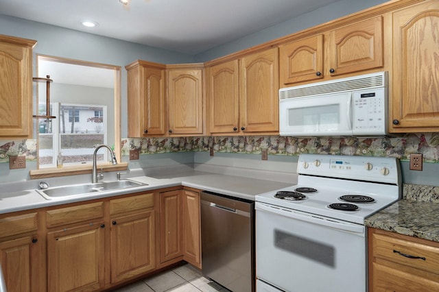 131 Forest Ln, Kimberling City, MO 65686 - kitchen with white appliances and light tile patterned floors