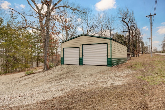 131 Forest Ln, Kimberling City, MO 65686 - detached garage featuring dirt driveway
