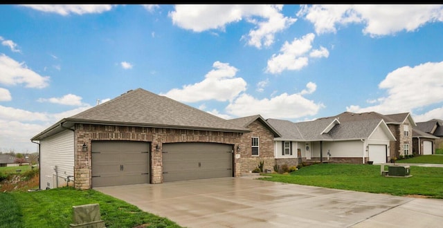 842 E Acacia Ln, Nixa, MO 65714 - view of front of property featuring an attached garage, concrete driveway, a front yard, brick siding, and a shingled roof