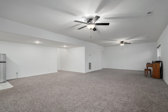 842 E Acacia Ln, Nixa, MO 65714 - unfurnished living room featuring a ceiling fan and carpet floors