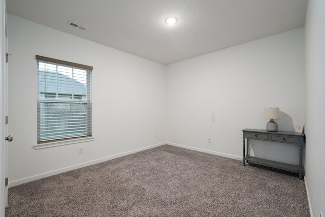 842 E Acacia Ln, Nixa, MO 65714 - spare room featuring carpet and recessed lighting