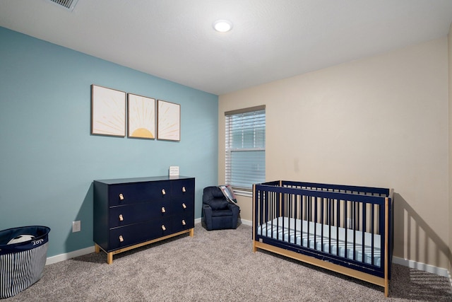 842 E Acacia Ln, Nixa, MO 65714 - carpeted bedroom featuring baseboards and a nursery area
