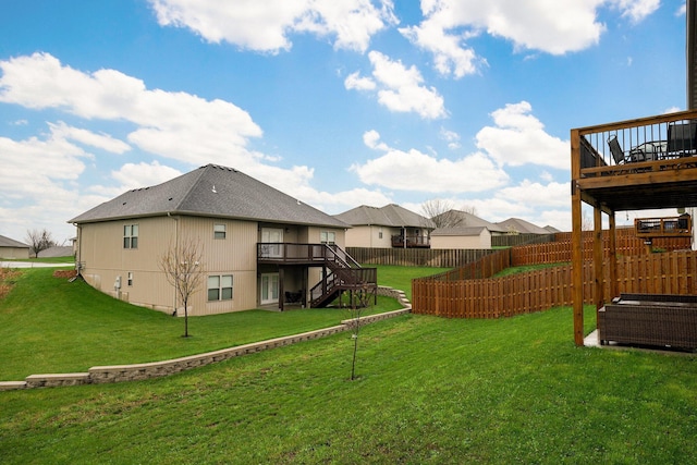842 E Acacia Ln, Nixa, MO 65714 - fenced backyard featuring a wooden deck and stairway