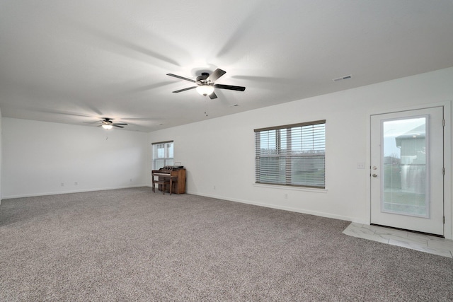 842 E Acacia Ln, Nixa, MO 65714 - unfurnished room with ceiling fan and light colored carpet