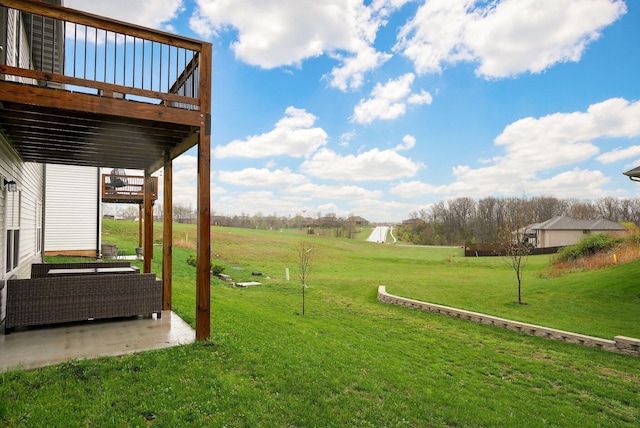 842 E Acacia Ln, Nixa, MO 65714 - view of grassy yard with a wooden deck and a patio area