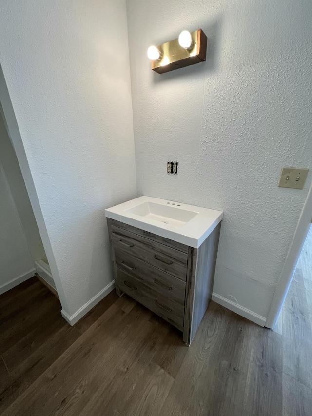 410 Tablerock Cir, Branson, MO 65616 - bathroom featuring wood finished floors and vanity